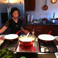 Photo taken at The @ravenouscouple Cooking Center by Julian F. on 4/14/2012