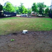 Photo taken at Atlantic Station Dog Park by Katie W. on 4/17/2012