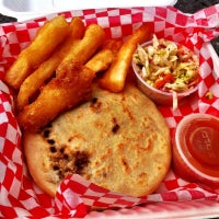 Foto diambil di Guanaco Salvadoran Cuisine food truck oleh Megan K. pada 6/8/2012