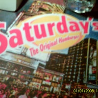 Photo taken at Saturday&amp;#39;s The Original Burger by Rubens L. on 4/19/2012