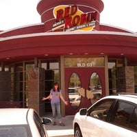 Photo taken at Red Robin Gourmet Burgers and Brews by Scott W. on 5/14/2012