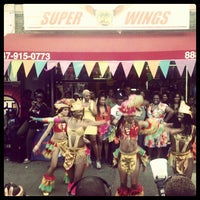 Photo taken at SUPER WINGS NY by Juan P. on 4/18/2012