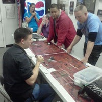 Photo taken at 8th Dimension Comics &amp;amp; Games by Mike H. on 3/10/2012
