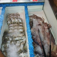 Photo taken at Tambuli Seafood Market by Alicia S. on 8/24/2012