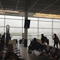 Photo taken at Gate A21 by Christophe A. on 4/28/2012