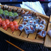 Photo taken at Wasabi Sushi Bar by Erin R. on 6/5/2012