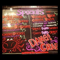 Photo taken at DANG! Crabs by Cassie D. on 5/7/2012