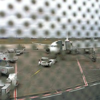 Photo taken at Gate A21 by / J. on 3/4/2012
