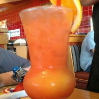 Photo taken at Red Robin Gourmet Burgers and Brews by Teresa G. on 7/29/2012