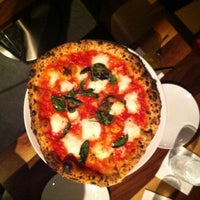 Photo taken at Cupola Pizzeria by Laura B. on 5/17/2012