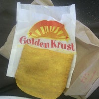 Photo taken at Golden Krust Caribbean Restaurant by Stringer B. on 7/3/2012