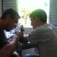 Photo taken at Marcelo Calle Tattoo by Guilherme P. on 3/3/2012