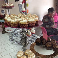 Photo taken at Let Them Eat Cupcakes by Christine S. on 7/28/2012