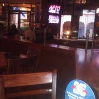 Photo taken at Champps Sports Bar &amp;amp; Grill by Ty D. on 2/4/2012