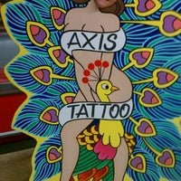 Снимок сделан в Axis Tattoo and Body Piercing пользователем Marc C. 5/13/2012