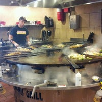 Photo taken at Genghis Grill by Wladimir F. on 7/8/2012