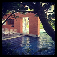 Photo taken at swimming pool@ Baan Navatara Condo by Sora I. on 5/12/2012