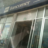 Photo taken at BBVA Bancomer Sucursal by Marco E. on 2/16/2012