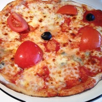 Photo taken at Pizza Express by Elif İ. on 2/14/2012