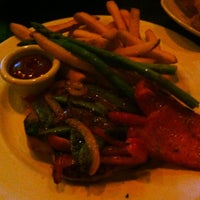 Photo taken at The Keg Steakhouse + Bar - Kingston by Widd G. on 3/18/2012