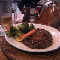 Photo taken at Outback Steakhouse by Takuo I. on 7/11/2012