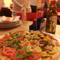 Photo taken at Domino&amp;#39;s Pizza by Juliana C. on 8/14/2012