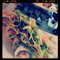 Foto tirada no(a) Sushi-Go por Mariale W. em 8/31/2012