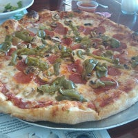 Photo taken at Lonzalo&amp;#39;s Pizzeria by Jarrod A. on 4/19/2012