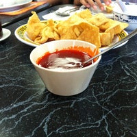 Photo taken at Chifa Du Kang Chinese Peruvian Restaurant by Miluska G. on 5/12/2012
