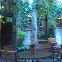 Photo taken at Cocorico Cafe by Robin B. on 7/29/2012