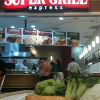 Photo taken at Super Grill Express by Sergio O. on 8/8/2012