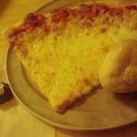 Photo taken at Times Square Pizza by Michelle S. on 2/24/2012