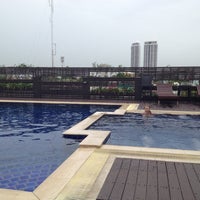 Photo taken at Rooftop Pool by Natalya S. on 7/19/2012