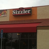 Photo taken at Sizzler by Rad R. on 5/3/2012