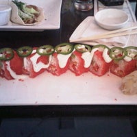 Photo taken at Crave Sushi by Radha P. on 4/13/2012