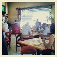 Photo taken at Son Cubano Café Gourmet &amp;amp; Restaurante by Ricardo on 5/2/2012