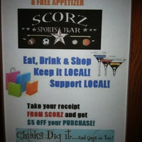 Photo taken at SCORZ Sports Bar and Grill by Amy J. on 3/11/2012