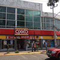 Photo taken at Oxxo by Claudio M. on 6/5/2012