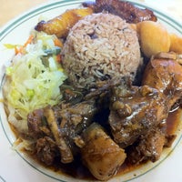 Photo taken at Island Breeze Jamaican Cuisine by Jeffrey S. on 6/12/2012