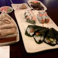Photo taken at Yummy Sushi by Laura B. on 3/17/2012