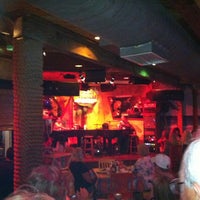 Photo taken at Rum Runners Dueling Piano Bar by Lauren P. on 3/25/2012