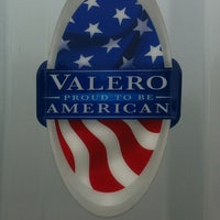 Photo taken at Valero by L. D. on 6/9/2012