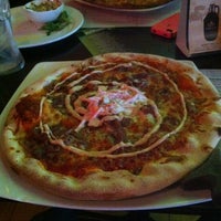 Photo taken at Pie Wood Fired Pizza Joint by Evan B. on 7/27/2012