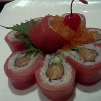 Photo taken at Ocean Blue Sushi Club by Anna L. on 3/4/2012