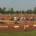Photo taken at Dixie Speedway Home of the Champions by Jared M. on 5/26/2012