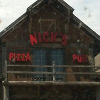 Photo taken at Nick&amp;#39;s Pizza &amp;amp; Pub by Brittany A. on 5/25/2012