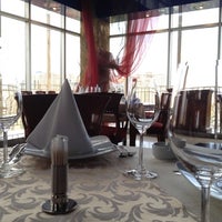 Photo taken at Salvador Dali Restaurant by Hamdi K. on 6/9/2012