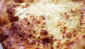 The 11 Best Places for Cheesy Bread in New York City