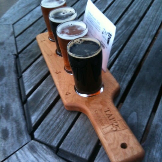 Photo taken at Tap 25 Craft Beer by Courtenay W. on 4/27/2012