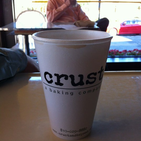 Photo taken at Crust by Tom H. on 6/25/2012